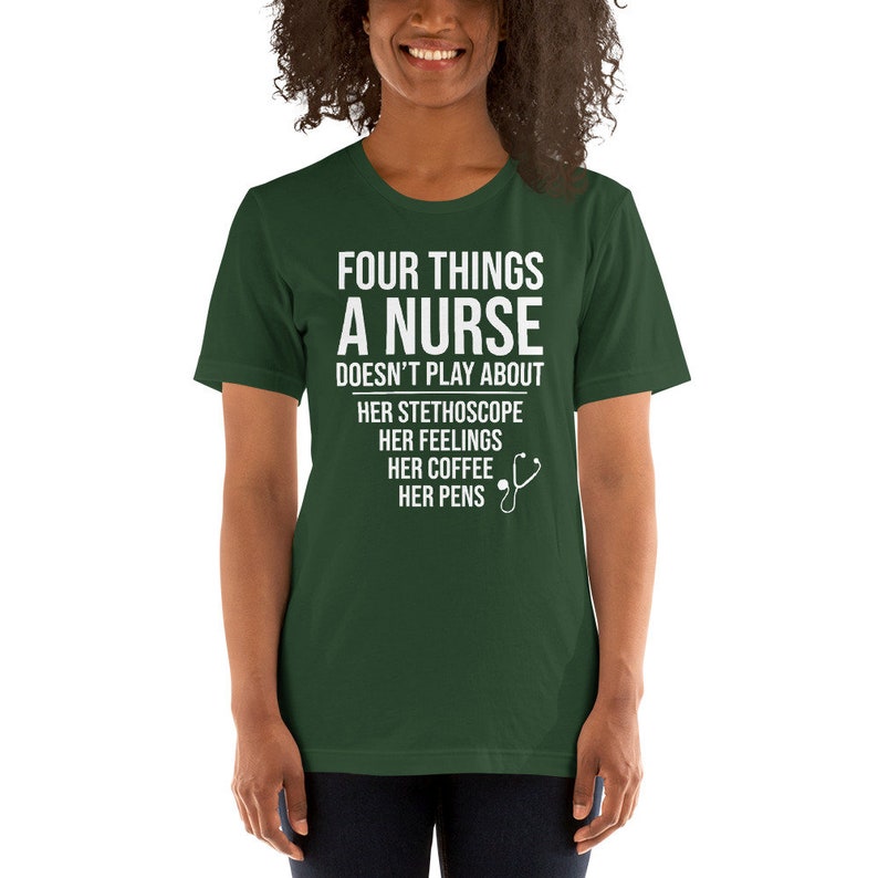 May include: A green t-shirt with white text that reads "Four things a nurse doesn't play about: her stethoscope, her feelings, her coffee, her pens". A white stethoscope icon is next to the text.