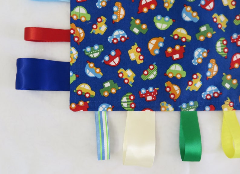 cars on blue ribbon blanket