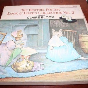 May include: Vintage Beatrix Potter "Look & Listen Collection Vol. 2" album cover. The cover features illustrations of anthropomorphic animals in a domestic setting. The album is "Told by Claire Bloom."