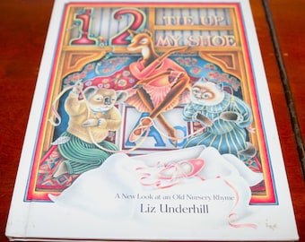 1, 2, Tie Up My Shoe: A New Look at an Old Nursery Rhyme Relié – 1 mai 1990 de Liz Underhill (Auteur)