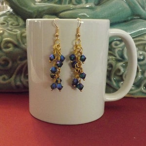 Emerald shimmer Swarovski Elements and gold dangle & drop earrings