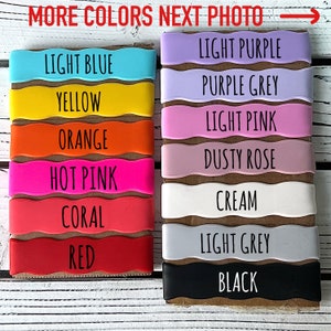 May include: A variety of silicone wristbands in different colors, including light blue, yellow, orange, hot pink, coral, red, light purple, purple grey, light pink, dusty rose, cream, light grey, and black. The wristbands are arranged in two rows, with the colors on the left side of the image and the colors on the right side of the image. The text "MORE COLORS NEXT PHOTO" is written above the wristbands.