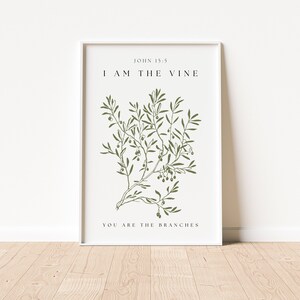 a framed print with the text 'John 15:5 I AM THE VINE YOU ARE THE BRANCHES'