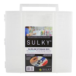 May include: A clear plastic Sulky Slimline storage box with a white handle. The box features a label with the Sulky logo and text, including "SLIMLINE STORAGE BOX" and "The ORIGINAL Thread Storage Solution". The box is designed to organize thread spools.