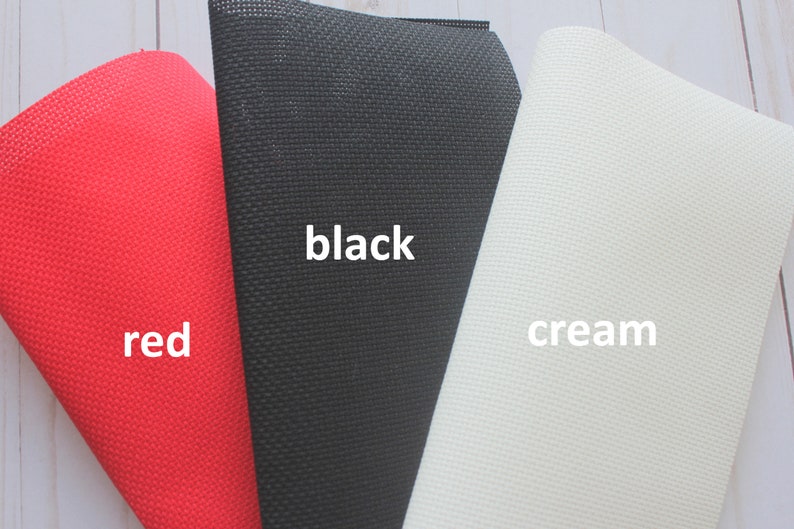 May include: Three fabric swatches in red, black, and cream. The swatches are labeled "red", "black", and "cream".