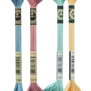 May include: Four skeins of DMC embroidery floss in pastel colors: light blue, dusty rose, seafoam green, and pale yellow. Each skein is labeled with a color code and brand information. The floss is tightly wound and ready for use.