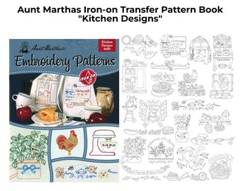 May include: An Aunt Martha's "Kitchen Designs" iron-on transfer pattern book. The cover shows embroidery patterns in blue and white. The book contains kitchen-themed embroidery designs, such as a rooster, a mixer, and herbs.