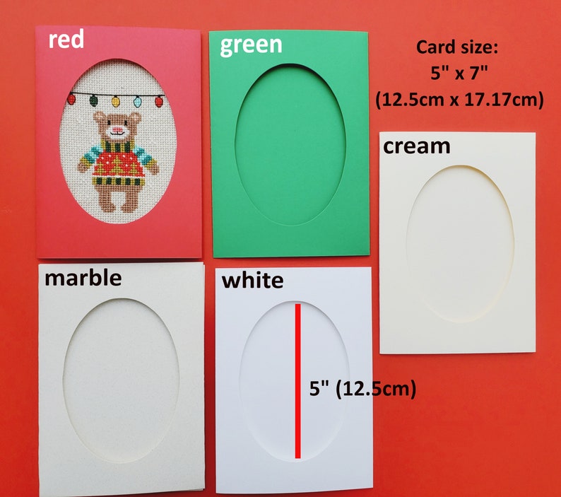 May include: Five blank greeting cards with oval cutouts. The cards are red, green, white, cream, and marble. The card size is 5 inches by 7 inches (12.5 cm by 17.17 cm).