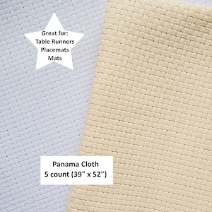 Puede incluir: Dos piezas de tela Panama de 5 hilos, una azul claro y otra beige, ambas miden 39 pulgadas por 52 pulgadas. El texto "Ideal para: Caminos de mesa Salvamanteles Alfombras" está en una estrella blanca. El texto "Panama Cloth 5 count (39" x 52")" está en un rectángulo blanco.