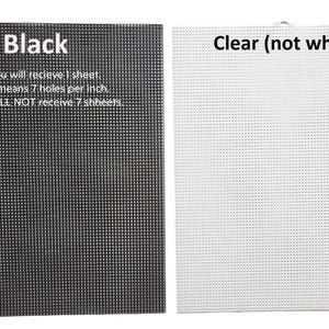 two black and white papers with white writing on them