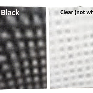 two black and white papers with white writing on them