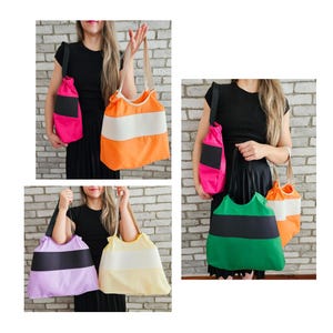 May include: Five different tote bags with a striped design and a black stripe across the middle. The bags are in various colors, including pink, orange, green, purple, and yellow.