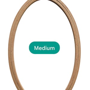 May include: A wooden embroidery hoop with a 8" x 4.8" (20cm x 12.3cm) inner diameter. The hoop is labeled "Medium".