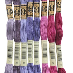six skeins of different colors of yarn