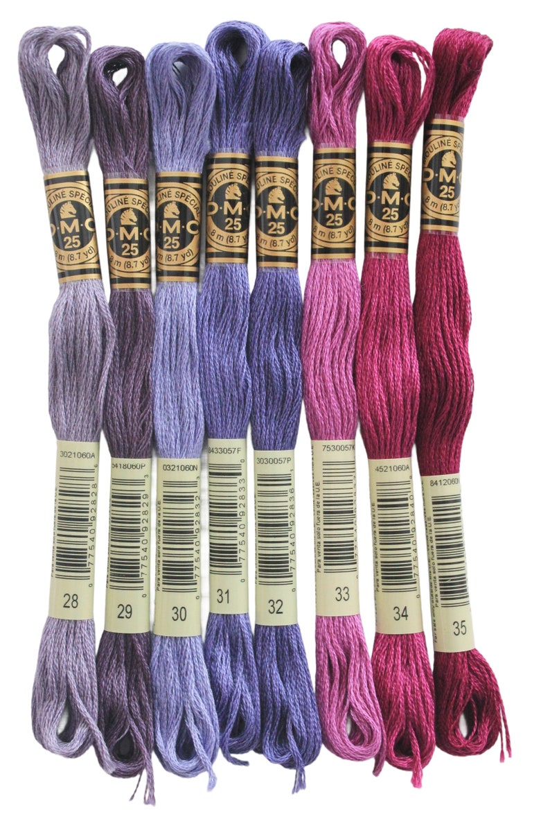 six skeins of different colors of yarn