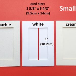 May include: Three cardstock mat boards in different colors: marble, white, and cream. Each mat board has a 4 inch (10.2 cm) opening for a photo or card. The card size is 3 5/8 inches by 5 4/8 inches (9.5 cm by 14 cm).