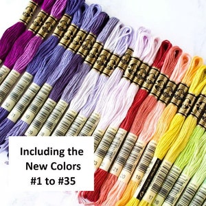 May include: A collection of embroidery floss in a variety of colors, including shades of purple, red, yellow, and green. The image includes the text "Including the New Colors #1 to #35". Each skein is labeled with a number.