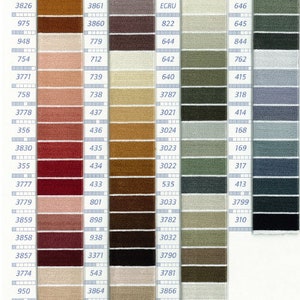 May include: A color chart from DMC featuring a wide array of embroidery floss shades. The chart displays numerous color swatches, each with a unique number, ranging from light neutrals to deep, rich hues. The DMC logo is at the top.
