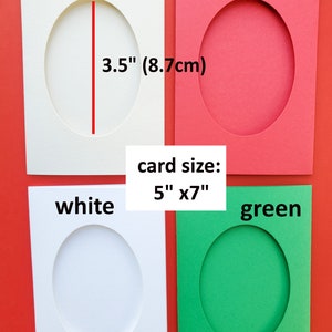 May include: Four 5x7 inch cards with oval cutouts. The cards are cream, red, white, and green. The oval cutout is 3.5 inches wide.
