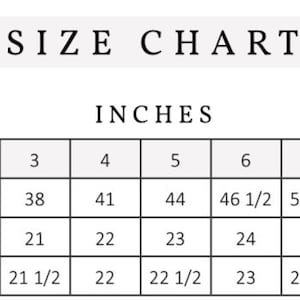 May include: A size chart in a grid format, with measurements in inches. The chart includes height, chest, and waist measurements for sizes ranging from 12 months to size 14. The text "SIZE CHART" is at the top.