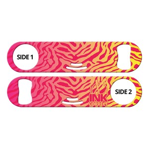 May include: A pink and yellow zebra print bottle opener with the text "SIDE 1" on one side and "SIDE 2" and "INK CORRECT" on the other side.