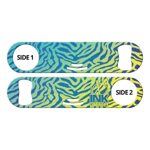 May include: A blue and yellow zebra patterned bottle opener with "SIDE 1" on one side and "SIDE 2" and the logo "INK CORRECT" on the other side.