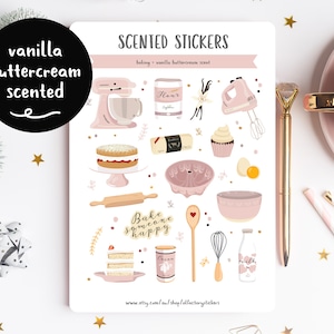 May include: A sheet of scented stickers with a vanilla buttercream scent. The stickers feature illustrations of baking supplies, including a mixer, a cake, a rolling pin, a bowl, and a whisk. The text "Bake someone happy" is also included on the sheet.