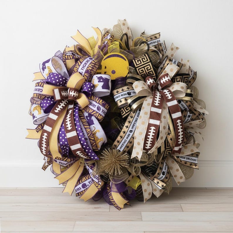 May include: A decorative wreath featuring football-themed ribbons in purple, gold, and brown. The wreath includes a miniature yellow football helmet and ribbons with the text "Tigers" and "New Orleans".
