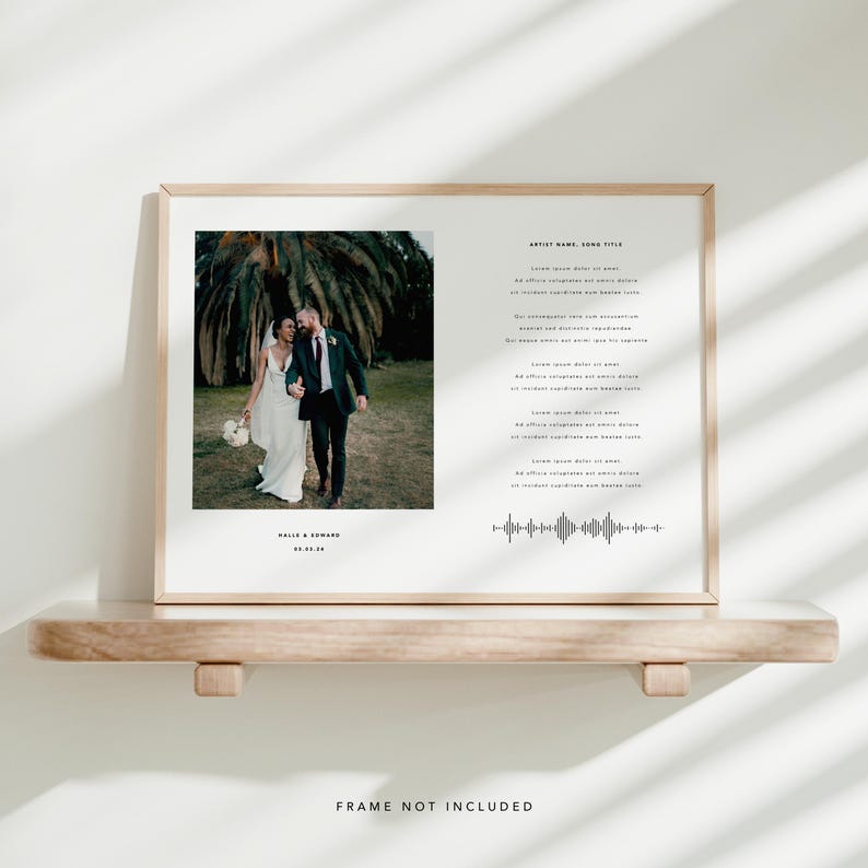 May include: A framed print featuring a wedding photo of a couple walking together. The print includes text with the names "Halls & Edward" and the date "05.03.24". The frame is light-colored, and the print also includes a sound wave graphic.