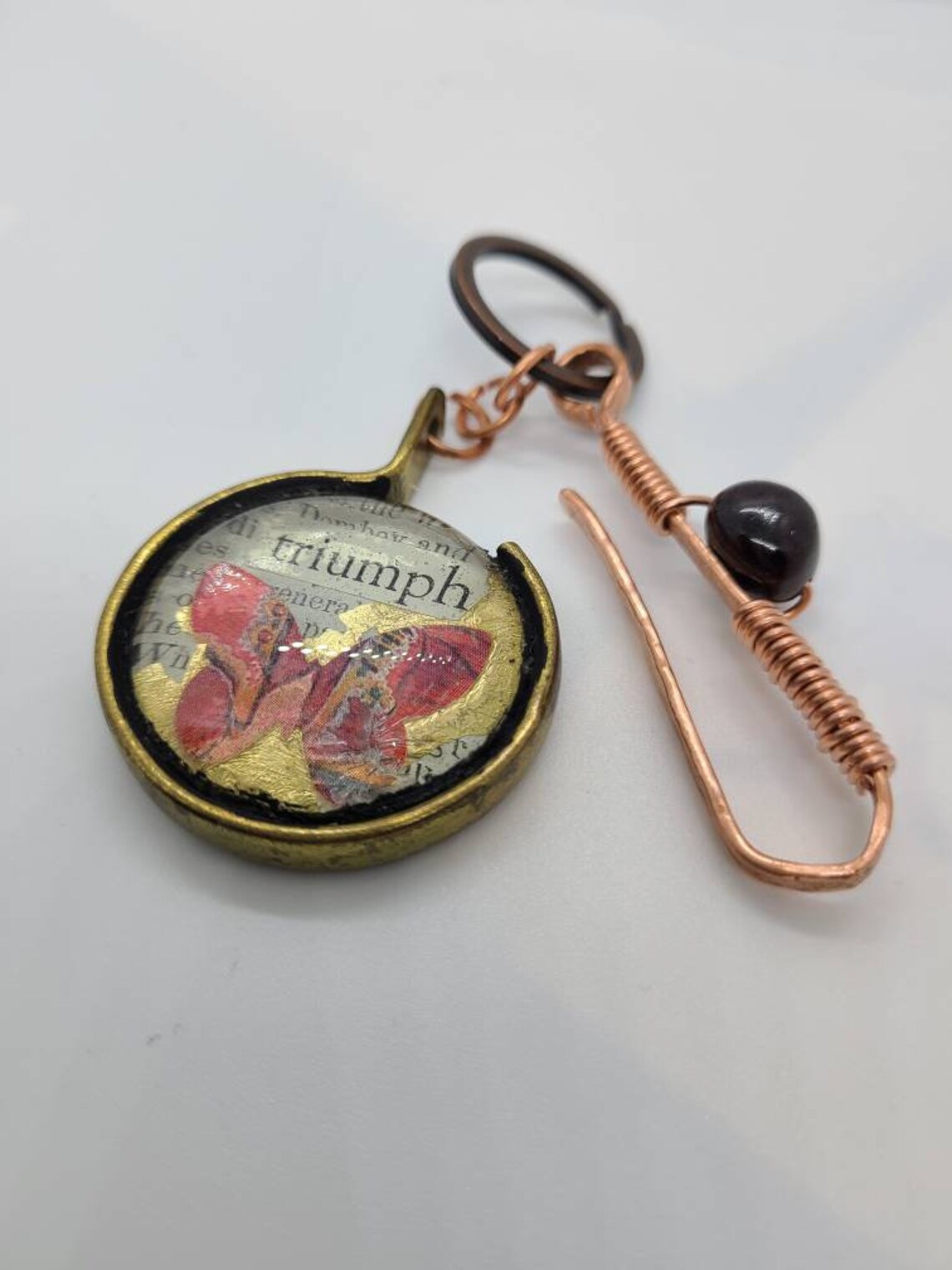 Triumph. Upcycled brass and glass keychain with vintage book Etsy