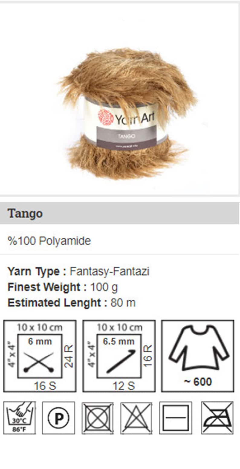 May include: A skein of brown faux fur yarn called "Tango" by Yarn Art. The yarn is 100% polyamide and weighs 100 grams. The estimated length is 80 meters. The yarn label shows care instructions for machine washing at 30 degrees Celsius (86 degrees Fahrenheit), hand washing, tumble drying, and ironing.
