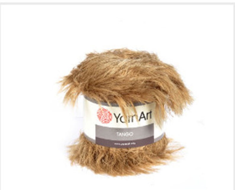 May include: A skein of brown faux fur yarn called "Tango" by Yarn Art.