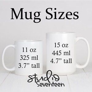May include: Two white ceramic mugs with black text showing the size and volume of each mug. The smaller mug is 11 oz (325 ml) and 3.7" tall. The larger mug is 15 oz (445 ml) and 4.7" tall. The text "Mug Sizes" is at the top of the image. The text "studio Seventeen" is at the bottom of the image.