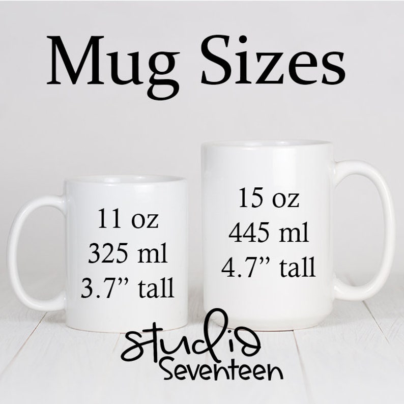 May include: Two white ceramic mugs with black text showing the size and volume of each mug. The smaller mug is 11 oz (325 ml) and 3.7" tall. The larger mug is 15 oz (445 ml) and 4.7" tall. The text "Mug Sizes" is at the top of the image. The text "studio Seventeen" is at the bottom of the image.