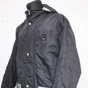 Kurtka przeciwdeszczowa Mercedes-Benz F1 Motorsport Reversible Racing Jacket – czarno-srebrna XL