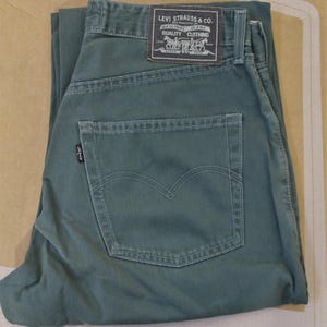 Levi's 502 jeans, groene denim, maat W30 L30: Italiaans gemaakt, rechte pasvorm, vintage.