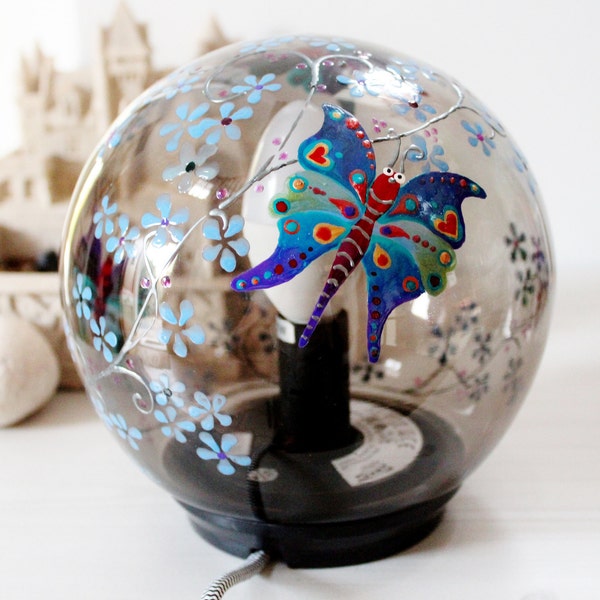 Hand painted table lamp, theme of butterflies and blue flowers. Single piece, signed and numbered