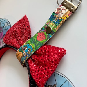Minnie Mouse Ear holder, Stained glass beauty and the beast keychain/ purse, Backpack disney ear holder