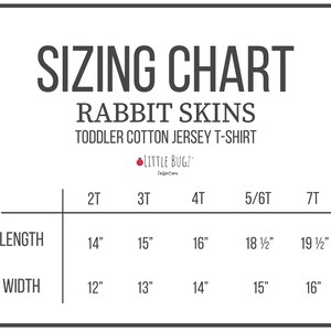 May include: Sizing chart for toddler cotton jersey t-shirts in sizes 2T, 3T, 4T, 5/6T, and 7T. The chart shows the length and width measurements in inches for each size.