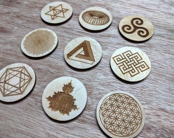 Set of nine wooden geometric tokens