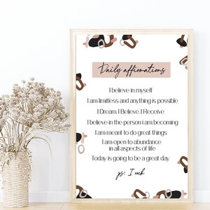 May include: A printable poster with a light brown background and abstract shapes in black, brown, and pink. The text reads "Daily affirmations" and includes positive affirmations such as "I believe in myself" and "Today is going to be a great day".