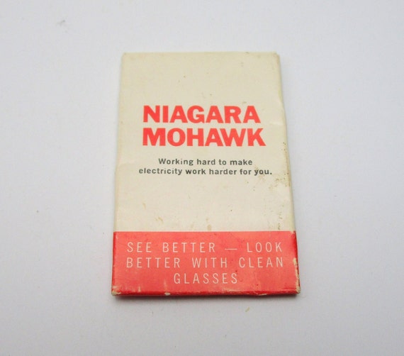 Vintage eyeglass tissues with Gem