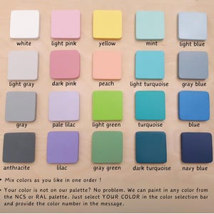 May include: A wooden color palette featuring 20 square color samples in various shades, including white, pink, yellow, blue, and green. Text on the image encourages mixing colors and custom color requests.