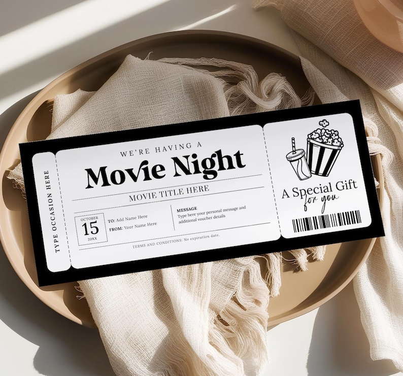 Peut inclure: Ticket de cin&eacute;ma imprimable noir et blanc avec le texte "We're having a Movie Night" et "A Special Gift for you". Le ticket comporte un espace pour la date, le titre du film, les noms du destinataire et de l'exp&eacute;diteur, ainsi qu'un message.
