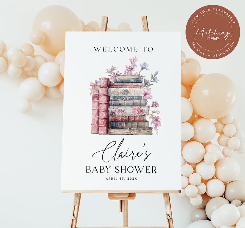 May include: A white sign with the text "Welcome to Claire's Baby Shower April 25, 202X" and a stack of vintage books with flowers on top.