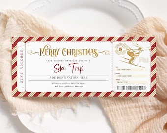 Puede incluir: Un vale de regalo a rayas rojas y doradas con el texto "Feliz Navidad" y "Esquí Trip". El vale está diseñado para parecer un billete de avión vintage con un esquiador en el lado derecho.