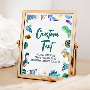 May include: A printable sign with a white background and a green border. The sign features a colorful illustration of dinosaurs, spaceships, and planets. The text on the sign reads "Custom Text" and "USE THIS TEMPLATE TO CREATE YOUR OWN SIGNS. CHANGE FONT, COLORS, SIZES, ETC."