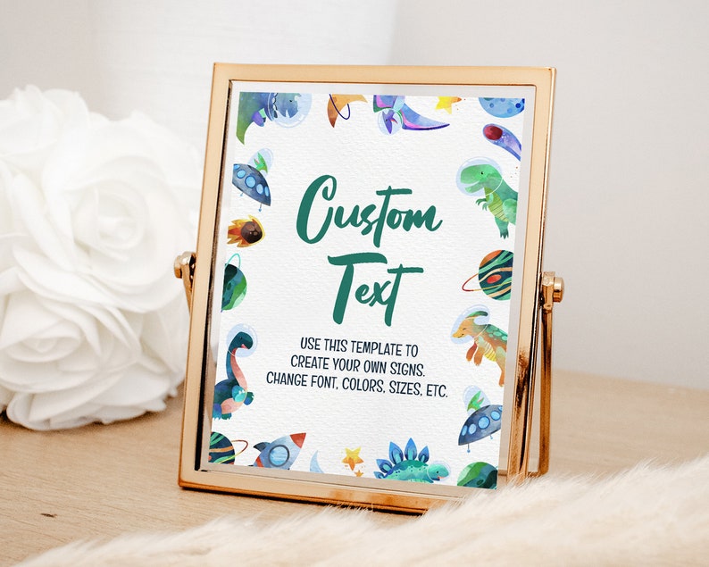 May include: A printable sign with a white background and a green border. The sign features a colorful illustration of dinosaurs, spaceships, and planets. The text on the sign reads "Custom Text" and "USE THIS TEMPLATE TO CREATE YOUR OWN SIGNS. CHANGE FONT, COLORS, SIZES, ETC."