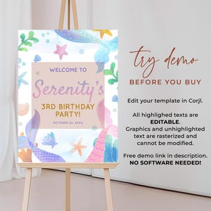 May include: A rectangular birthday party welcome sign featuring a watercolour mermaid theme with blue, pink, and purple scales, starfish, and seaweed. The text reads: WELCOME TO Serenity's 3RD BIRTHDAY PARTY! OCTOBER 23, 20XX on a light pink background.
