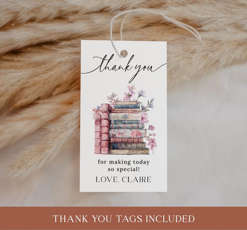 Może przedstawiać: Biała etykieta z napisem "thank you" w eleganckiej czcionce. Poniżej akwarelowa ilustracja stosu książek z kwiatowymi akcentami. Tekst "for making today so special! LOVE. CLAIRE" jest r&oacute;wnież obecny.